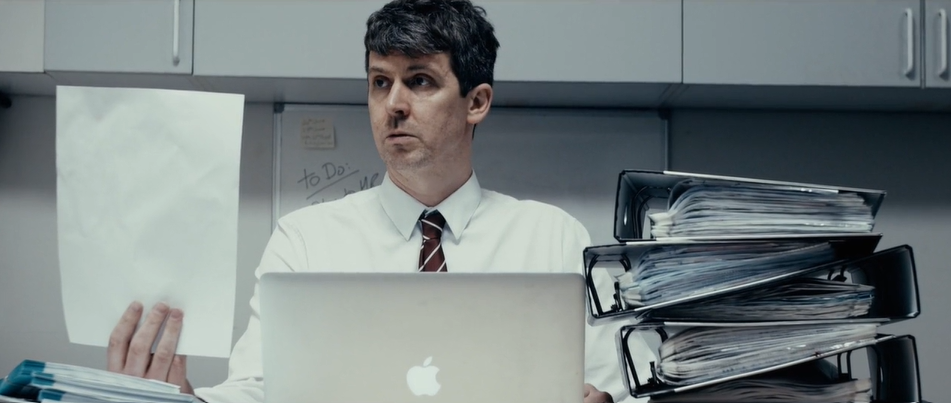 man doing office work